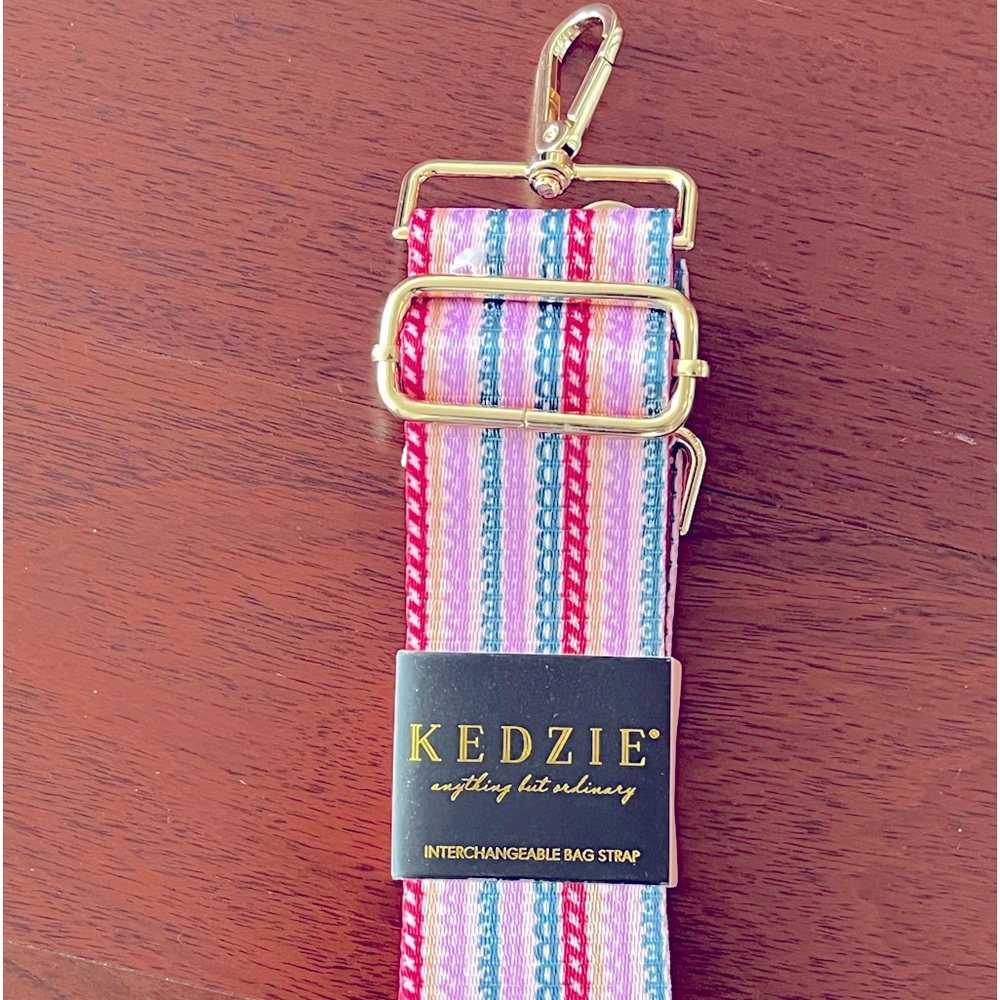 Kedzie crossbody purse strap adjustable to 55” and 2” wide.
